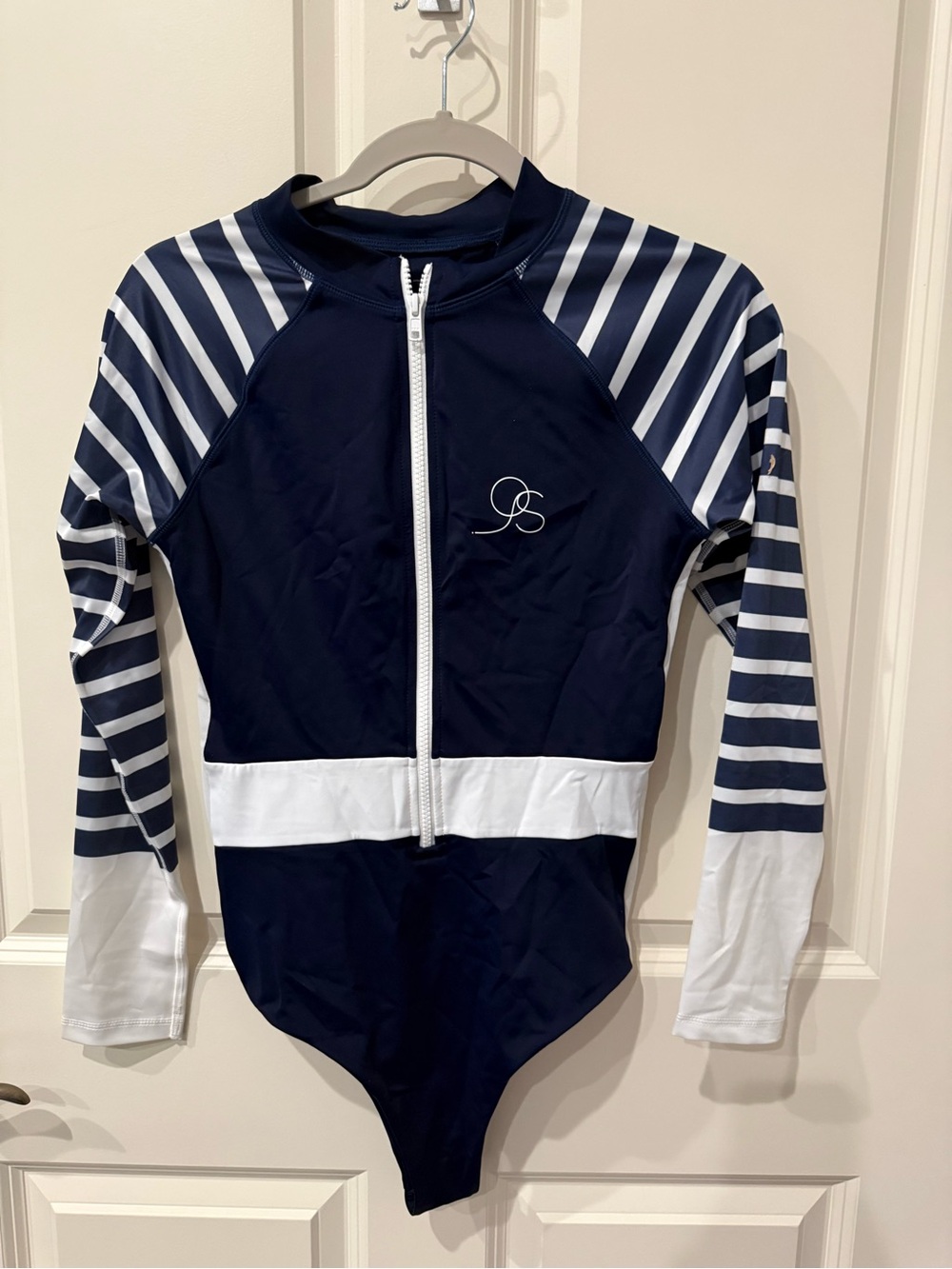 NWOT Ocean Soul Women’s Navy Sulawesi long-Sleeve Zip One-Piece Swimsuit, large.
